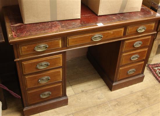 An Edwardian walnut pedestal desk W.122cm